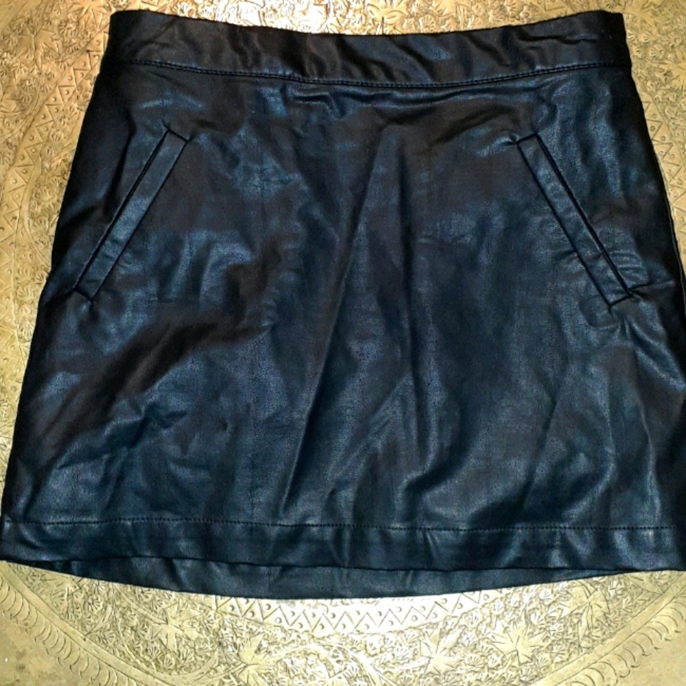 Black leather mini skirt.